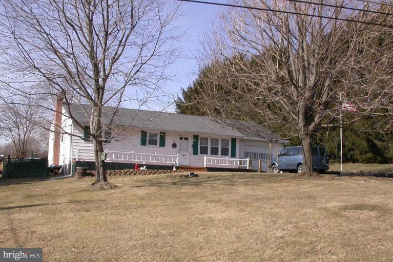 2520 Fairmount Road Hampstead, MD 21074 - Photo 1 of 12 front view of a house with a yard