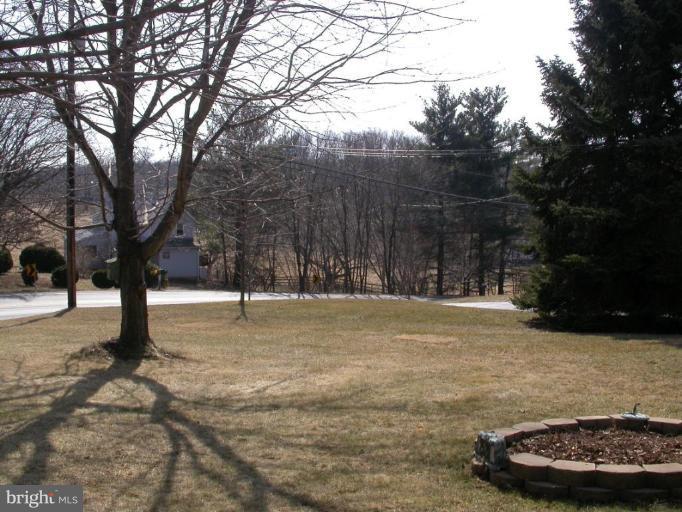 2520 Fairmount Road Hampstead, MD 21074 - Photo 11 of 12 a view of a backyard with large trees