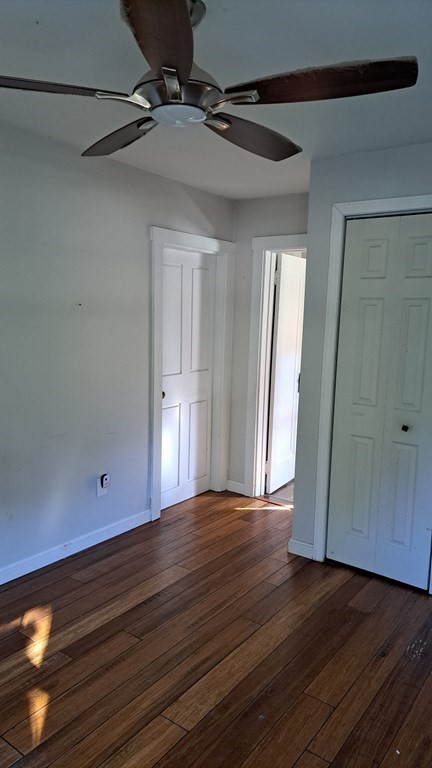 135 Thayer Road New Ipswich, NH 03071 - Photo 11 of 24 a view of an empty room with wooden floor