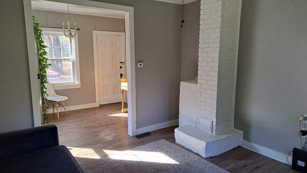 135 Thayer Road New Ipswich, NH 03071 - Photo 6 of 24 a view of an entryway with wooden floor and door