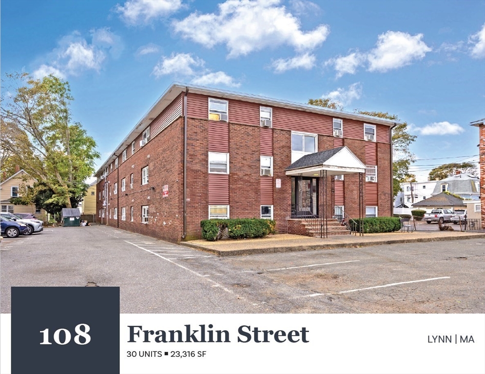 108 Franklin Street Lynn, MA 01902 - Photo 1 of 15 a front view of a building with garden