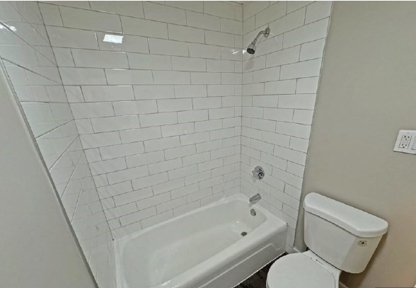 108 Franklin Street Lynn, MA 01902 - Photo 14 of 15 a bathroom with a toilet and bathtub