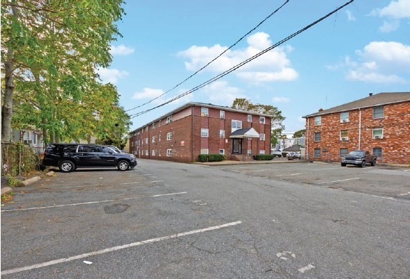 108 Franklin Street Lynn, MA 01902 - Photo 5 of 15 a car parked in front of a building