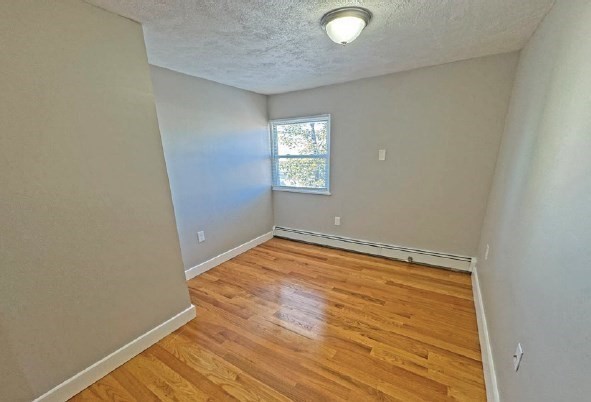 108 Franklin Street Lynn, MA 01902 - Photo 9 of 15 a view of empty room with wooden floor