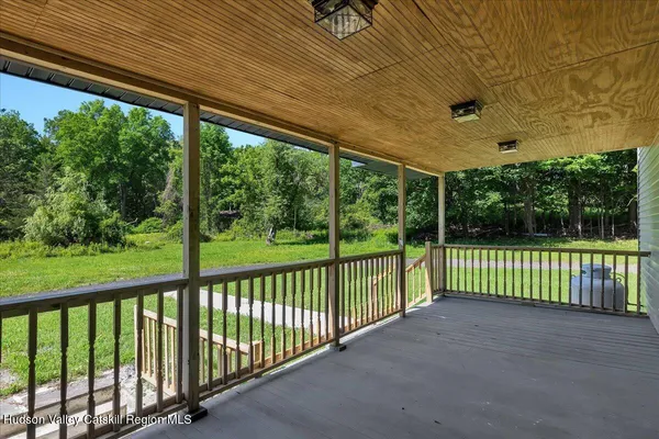 a view of a house with a big yard