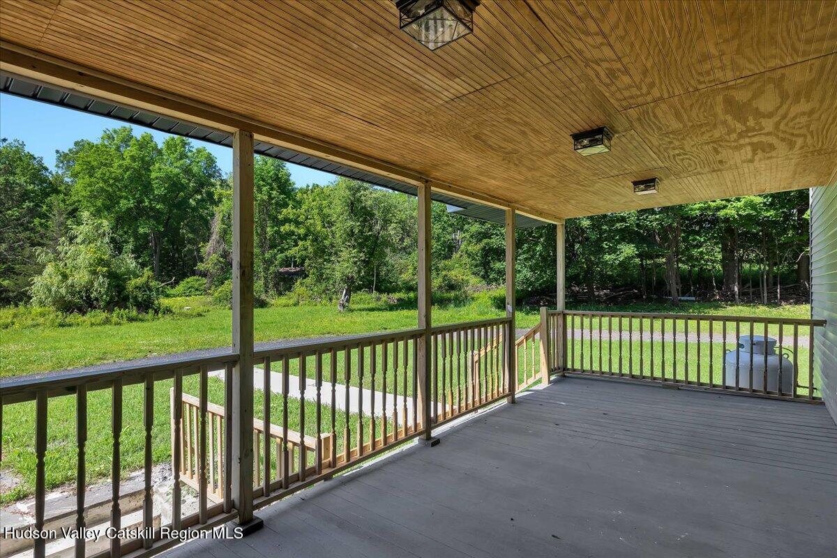 3603 County Rte 26 Greenville, NY 12083 - Photo 31 of 36 a view of a porch with a big yard