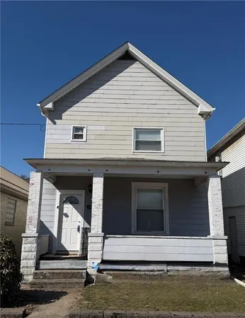 a view of house with pool