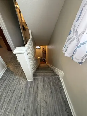 a view of entryway with wooden floor