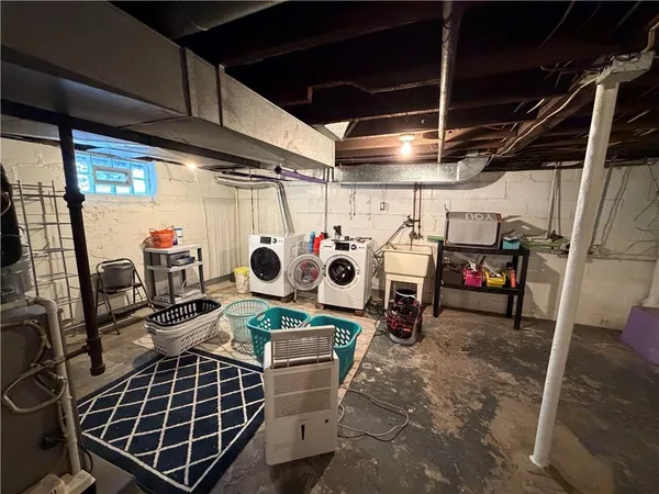 storage and utility room with window