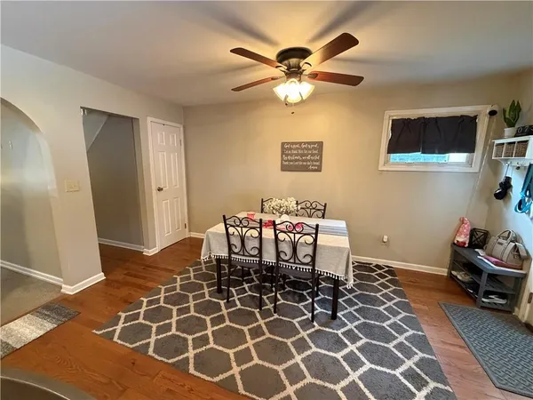 a view of a dining room with furniture