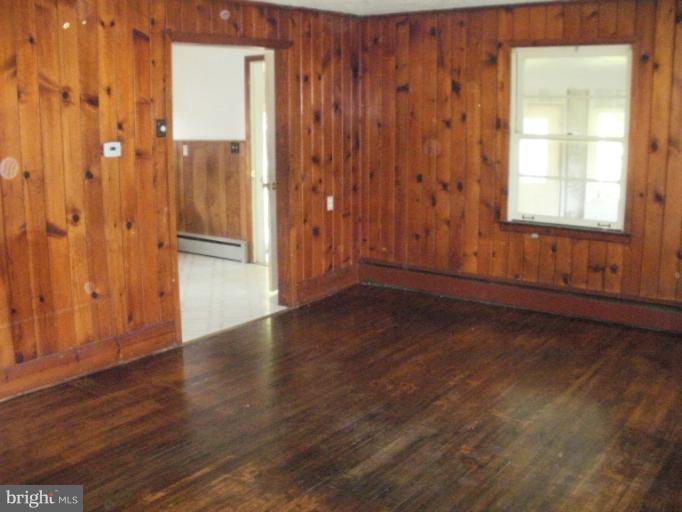 13840 Penn Shop Road Mount Airy, MD 21771 - Photo 18 of 29 a view of wooden floor and windows in a room