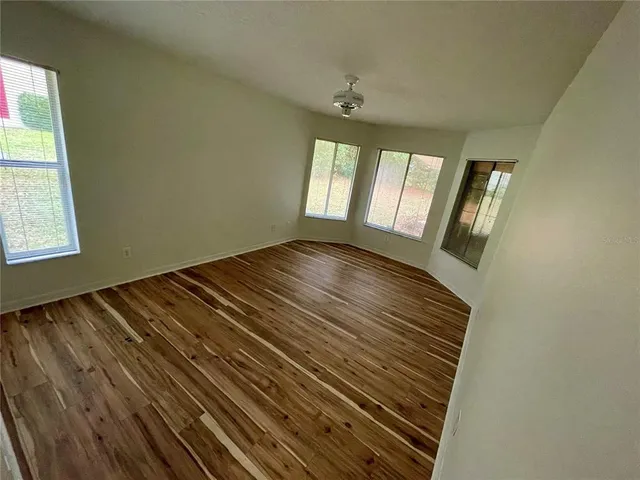 a view of an empty room and window
