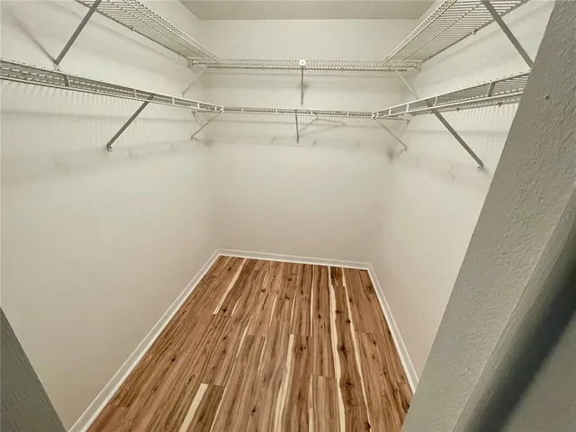 a view of a room with racks on the wall