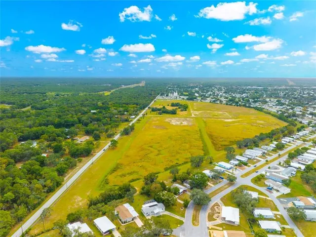 a view of swimming pool with an outdoor space and seating area