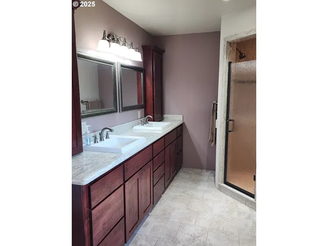 a bathroom with a tub and a toilet