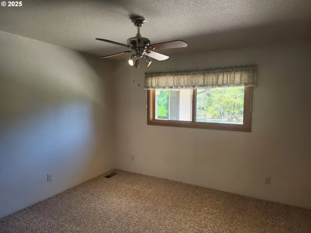 a hallway with washer and dryer