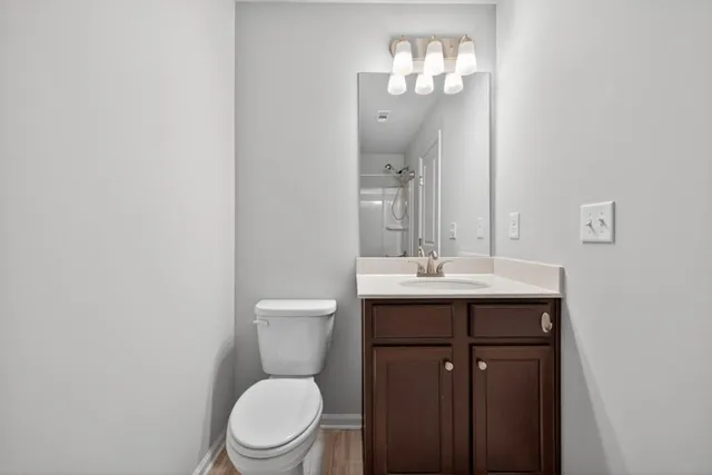 a bathroom with a shower and a bath tub