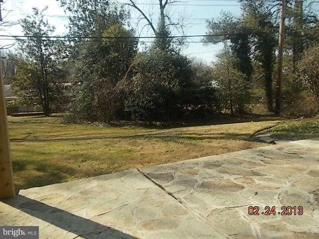 6218 Benhurst Road Baltimore, MD 21209 - Photo 11 of 13 a view of a swimming pool with an outdoor space