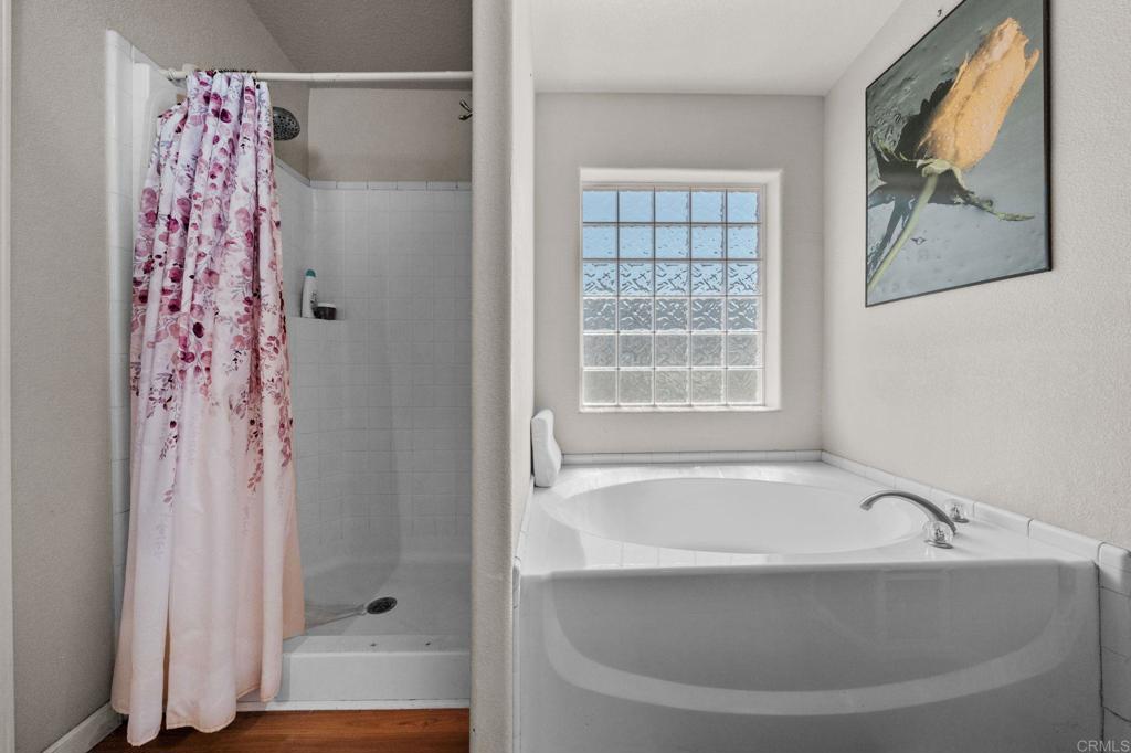 22002 Lyons Valley Road Alpine, CA 91901 - Photo 25 of 75 a bath tub sitting next to a window
