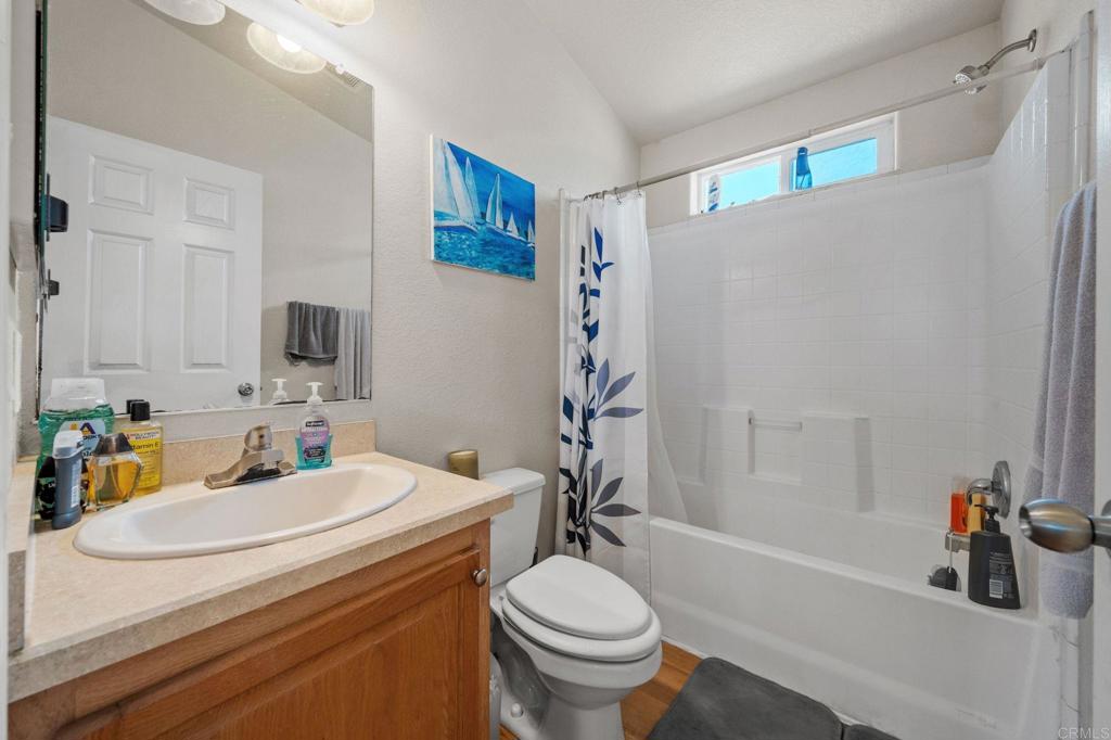 22002 Lyons Valley Road Alpine, CA 91901 - Photo 26 of 75 a bathroom with a sink toilet and shower