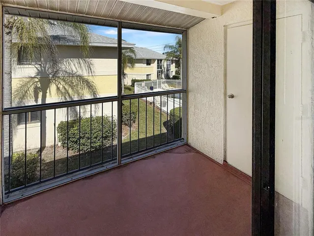 a view of a room with a large window