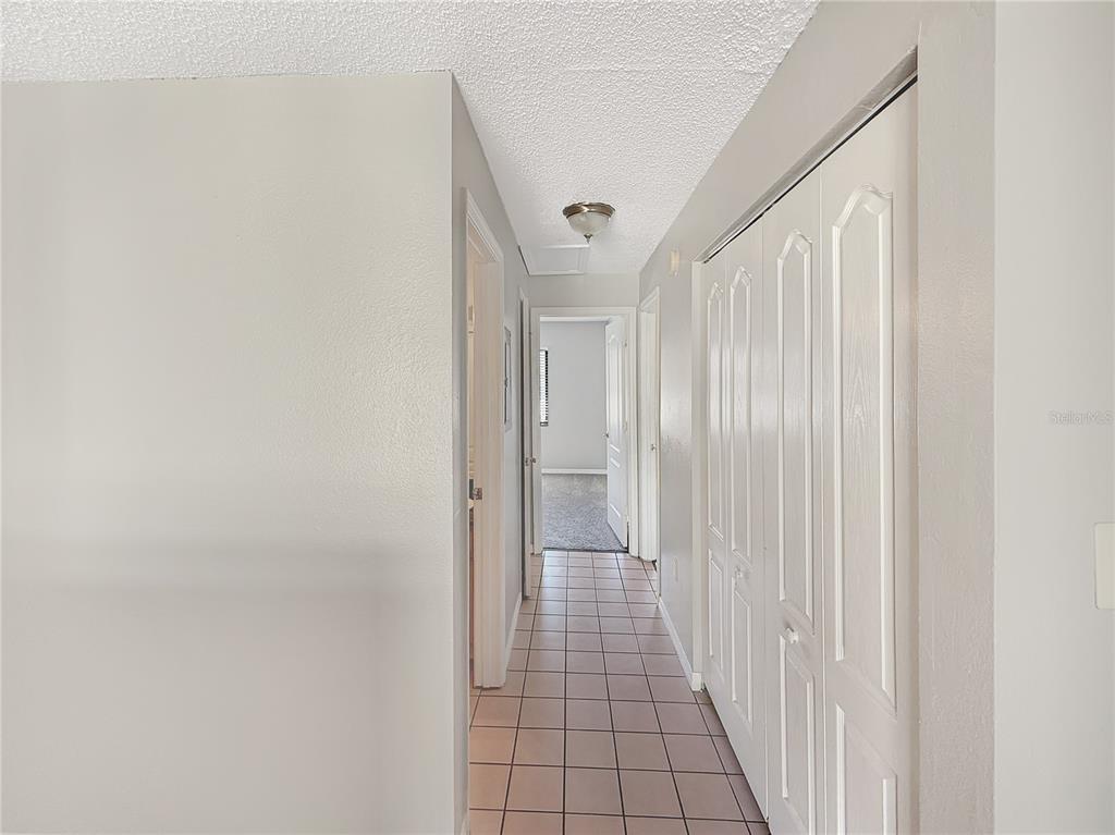 90 Hidden Lake Drive, Unit 132 Sanford, FL 32773 - Photo 6 of 13 a view of a hallway