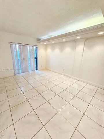 a view of a room & utility room