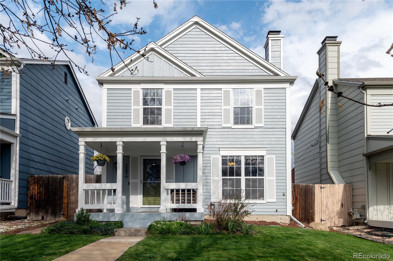 2696 Perry Street Denver, CO 80212 - Photo 2 of 40 front view of a house with a yard