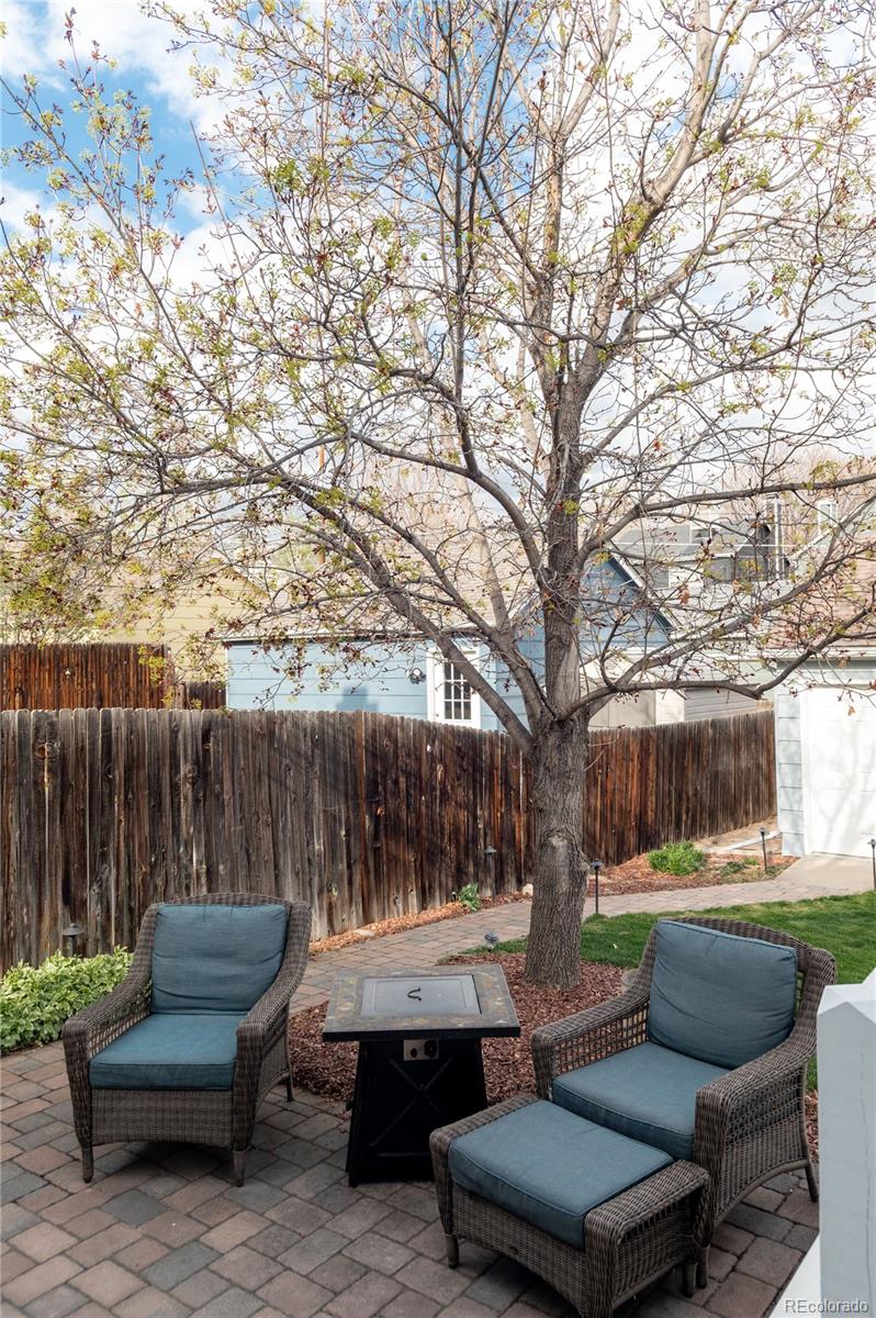 2696 Perry Street Denver, CO 80212 - Photo 38 of 40 a view of backyard with seating space and wooden fence