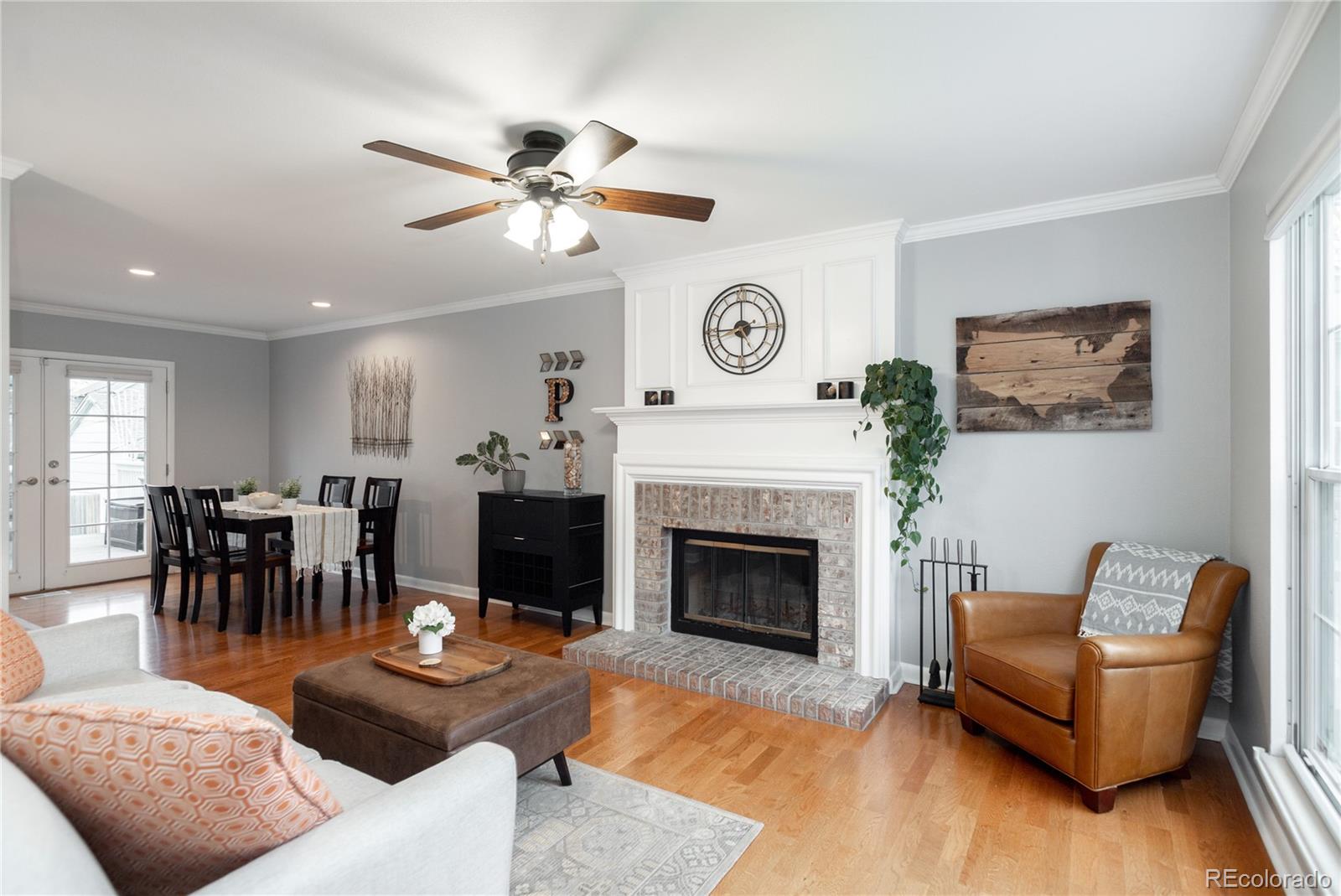 2696 Perry Street Denver, CO 80212 - Photo 8 of 40 a living room with furniture and a fireplace