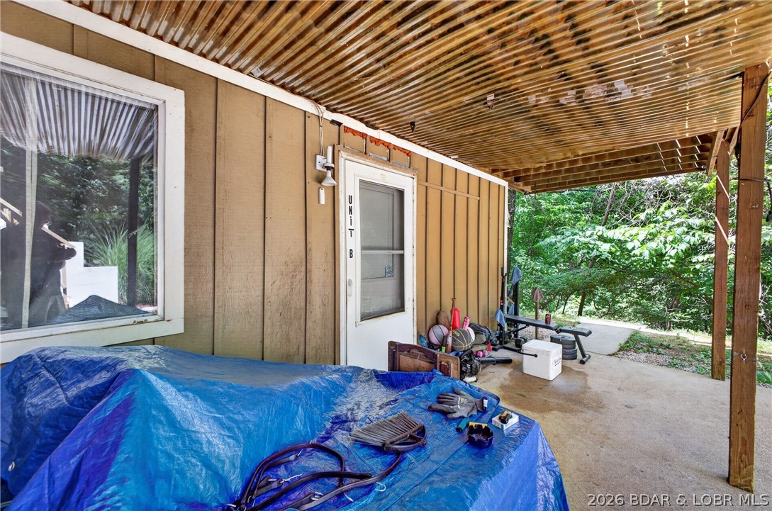 247 Wilmore Road Lake Ozark, MO 65049 - Photo 27 of 33 Patio and yard.