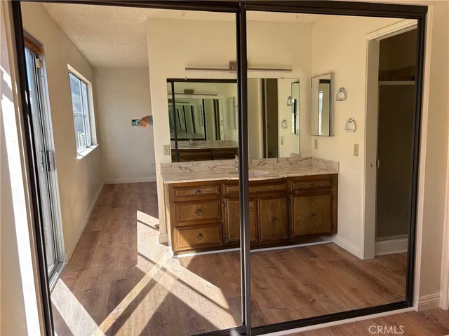 a view of a hallway with windows