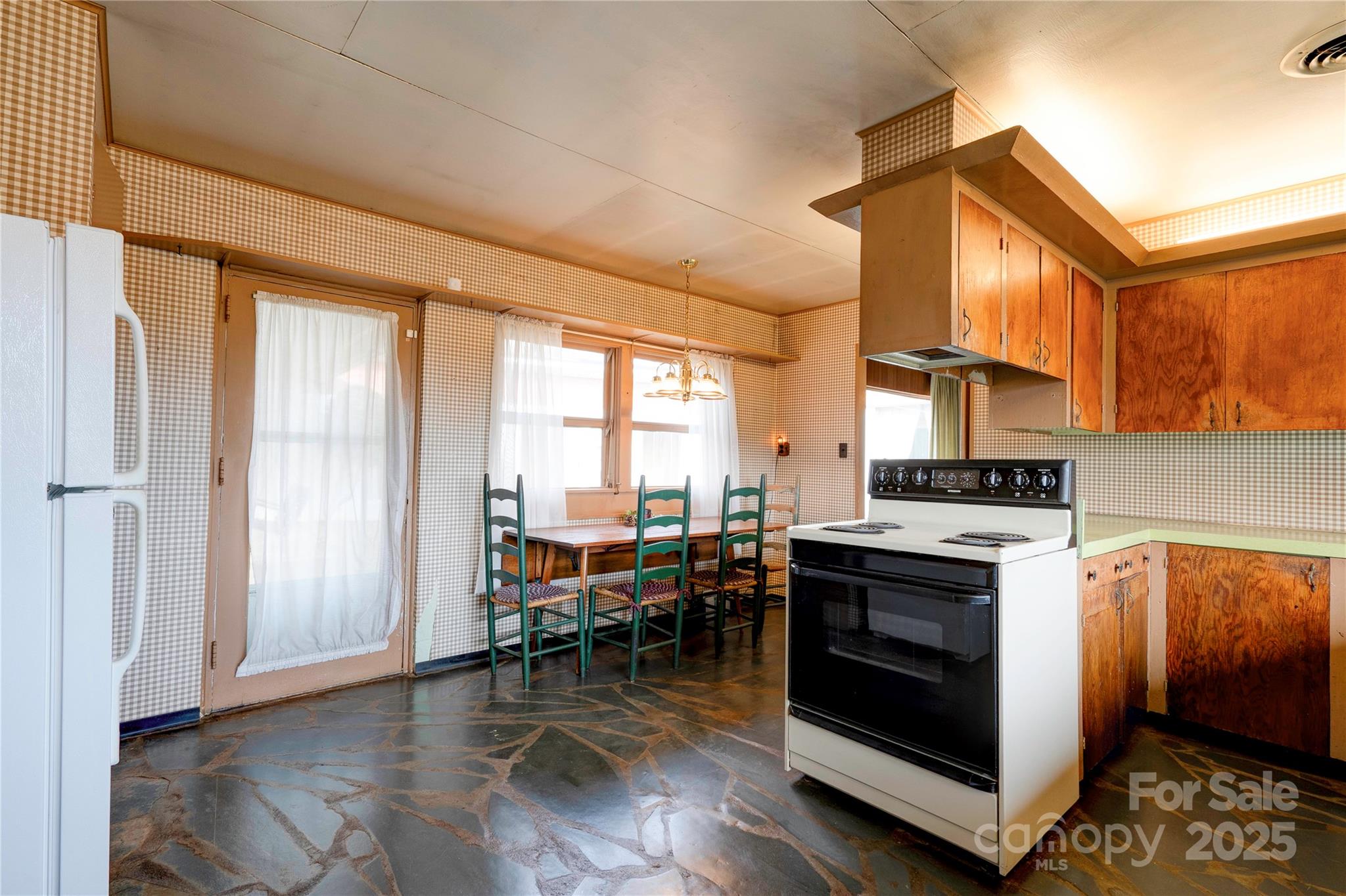 3809 Polkville Road Shelby, NC 28150 - Photo 11 of 48 a kitchen with stove and wooden floor