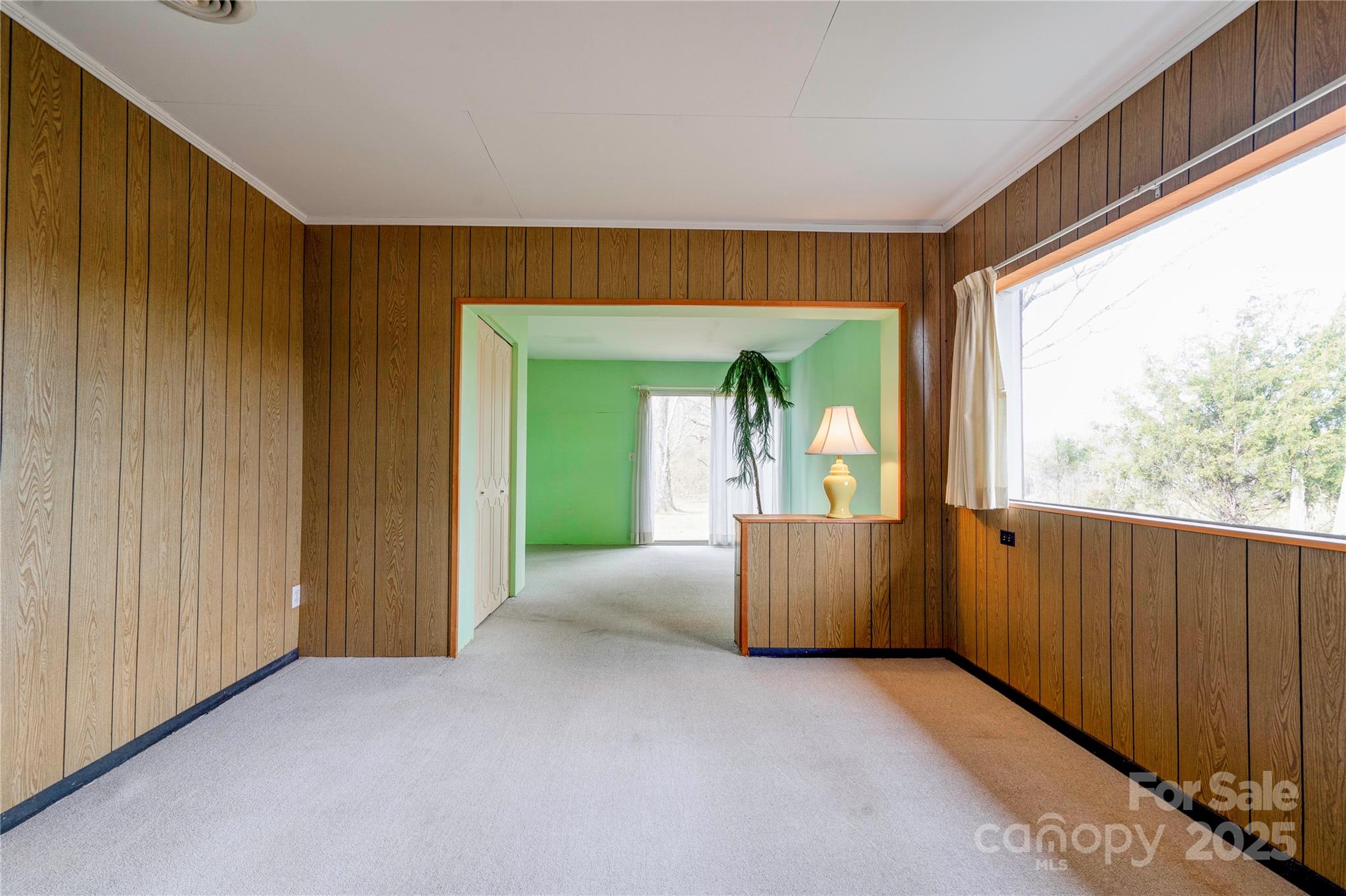 3809 Polkville Road Shelby, NC 28150 - Photo 20 of 48 wooden floor in an empty room with a window