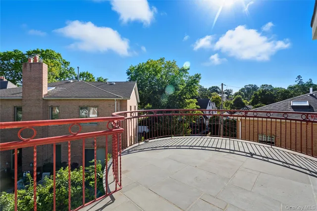 a view of balcony with furniture