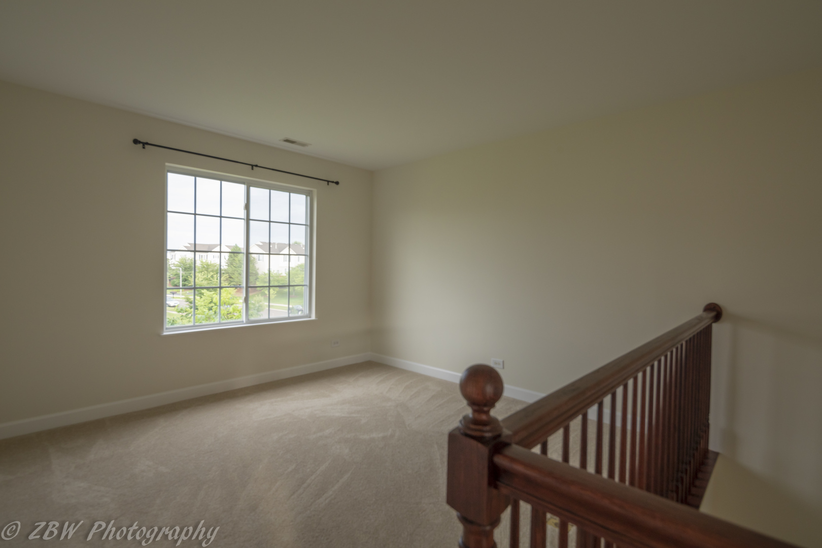 1906 Indian Hill Lane, Unit 1906 Aurora, IL 60503 - Photo 8 of 13 a view of an empty room with a window