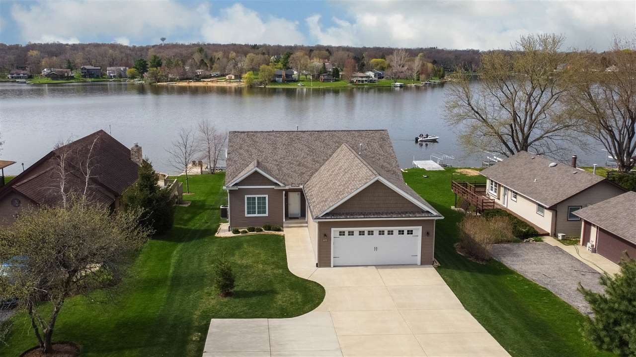 873 Breckenboro Road Davis, IL 61019 - Photo 1 of 41 an aerial view of a house with garden space and lake view