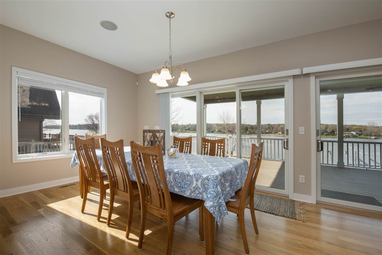 873 Breckenboro Road Davis, IL 61019 - Photo 14 of 41 a view of a dining room with furniture window and wooden floor