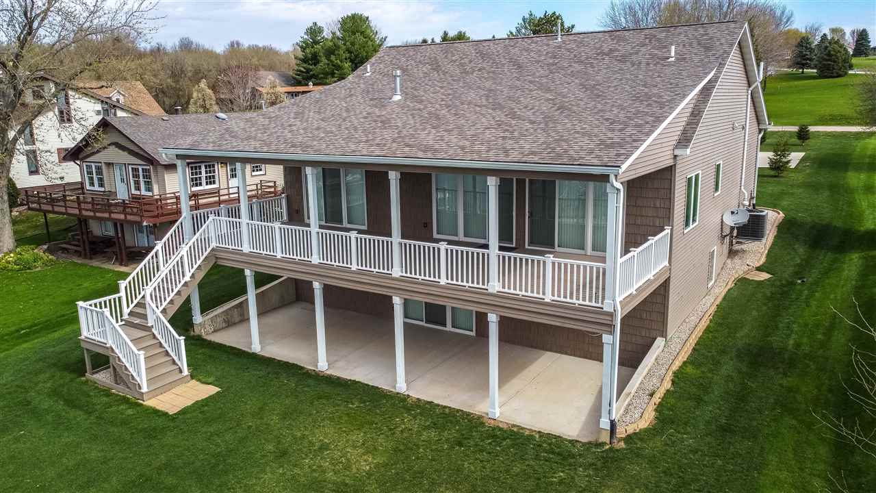 873 Breckenboro Road Davis, IL 61019 - Photo 2 of 41 a view of a house with backyard porch and sitting area