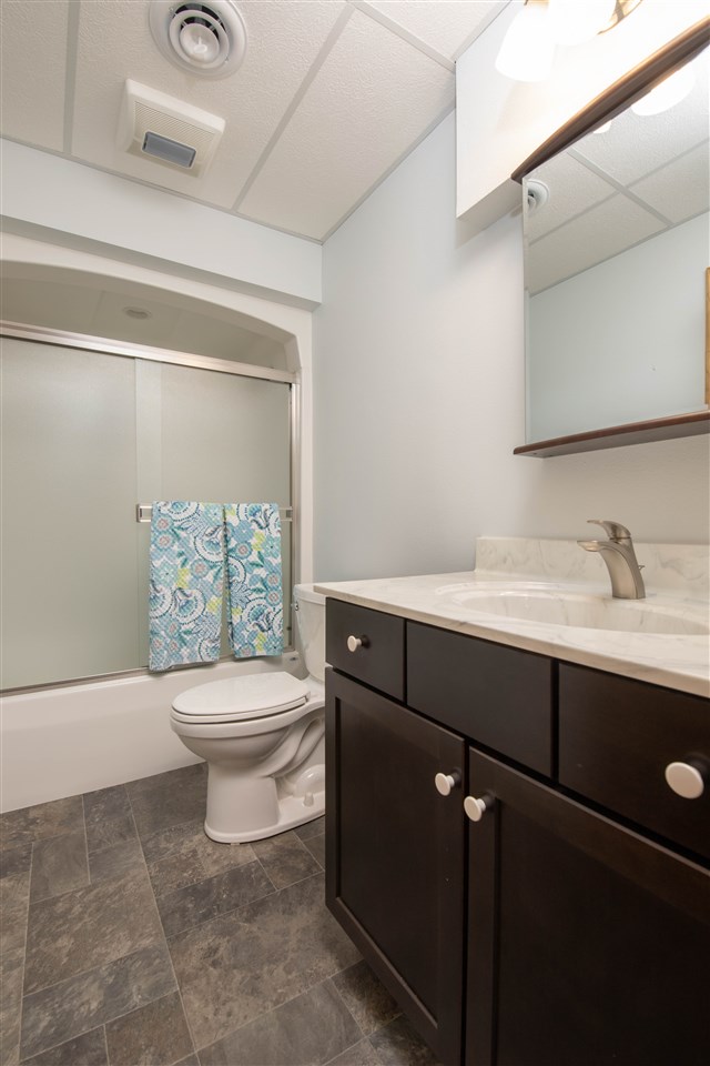 873 Breckenboro Road Davis, IL 61019 - Photo 27 of 41 a bathroom with a toilet a sink and mirror