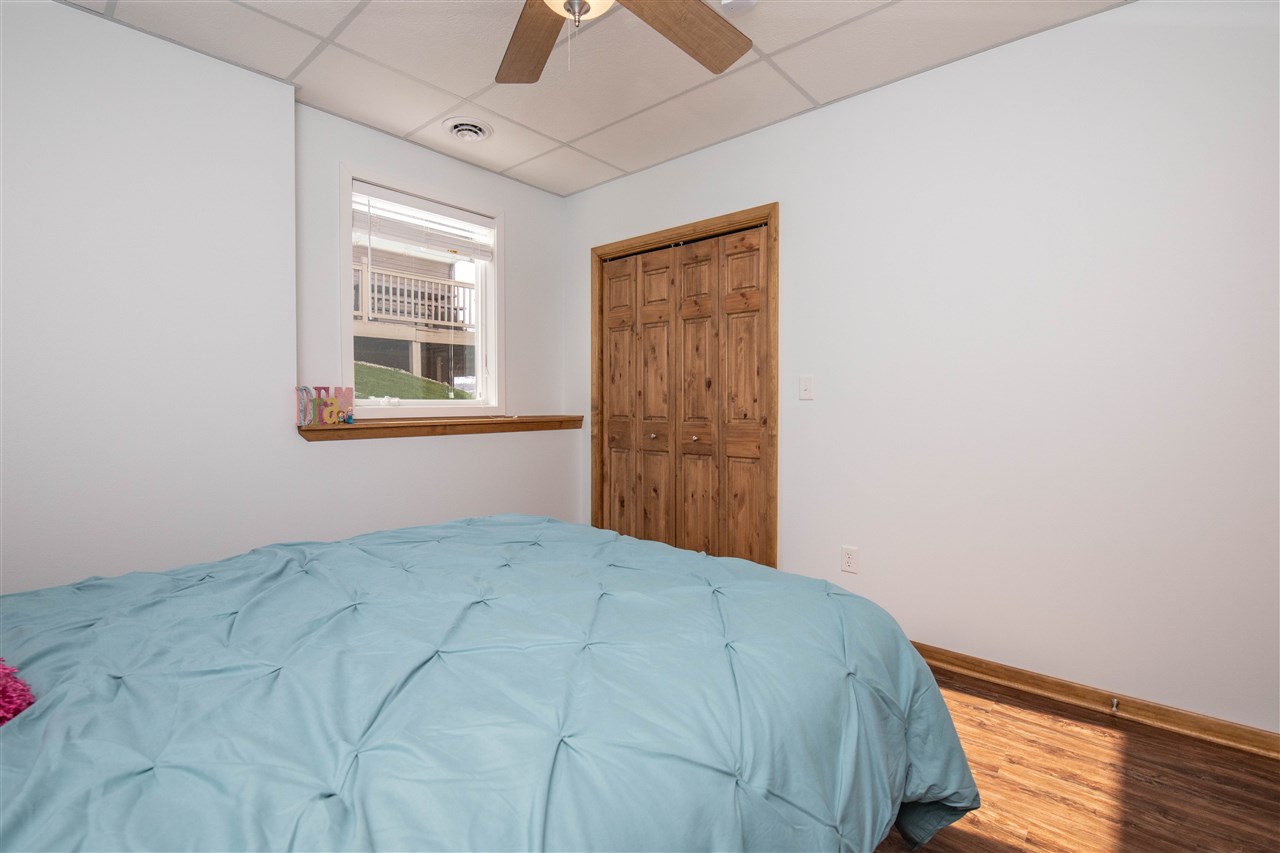 873 Breckenboro Road Davis, IL 61019 - Photo 29 of 41 a bedroom with a bed and a window