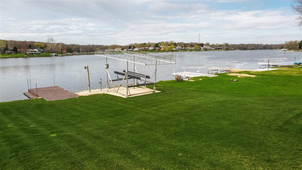 873 Breckenboro Road Davis, IL 61019 - Photo 5 of 41 a view of a lake with houses in the back