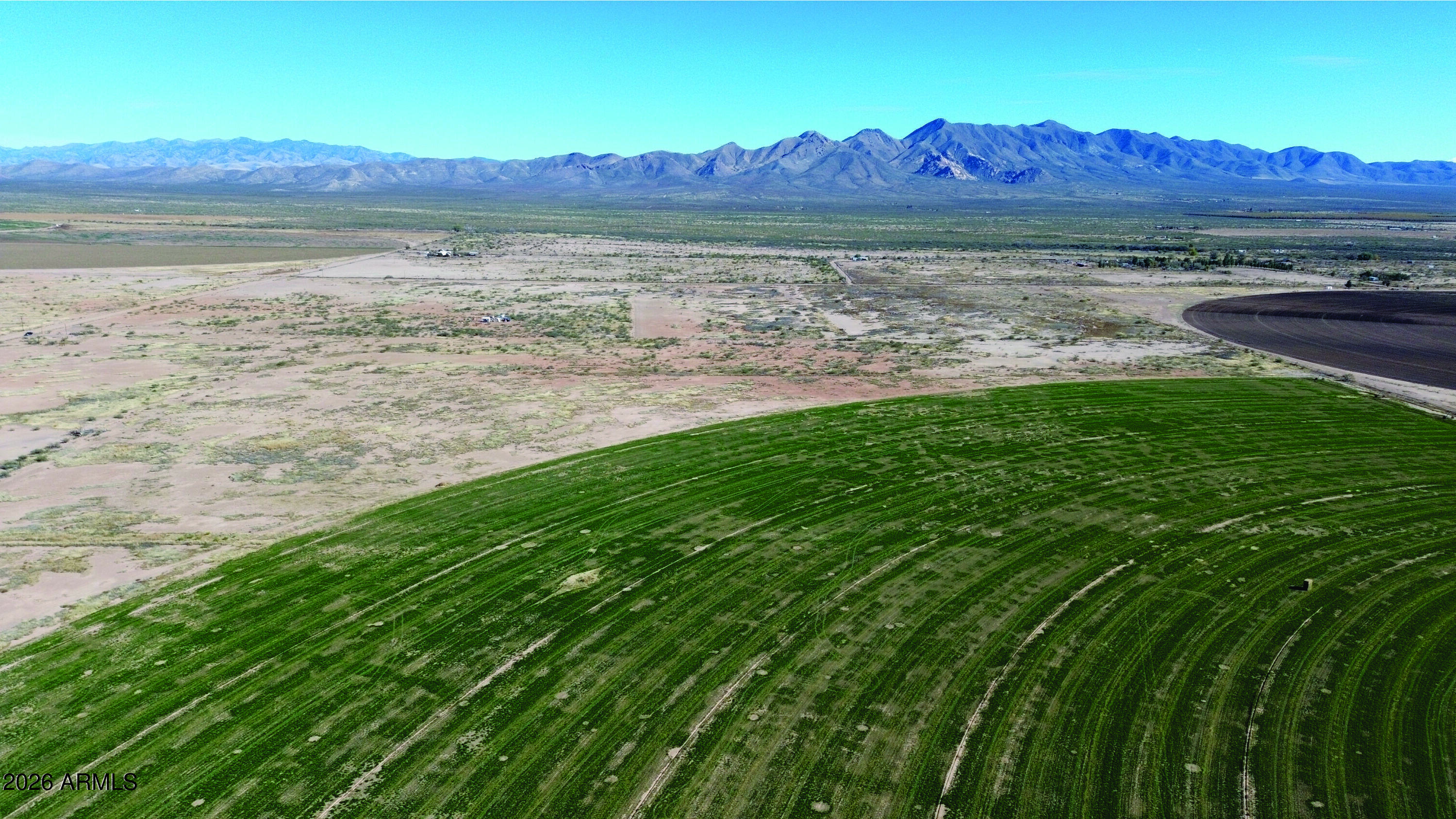 4.10-ac Thompson Road, Unit B Elfrida, AZ 85610 - Photo 13 of 34 a view of a lake with a mountain
