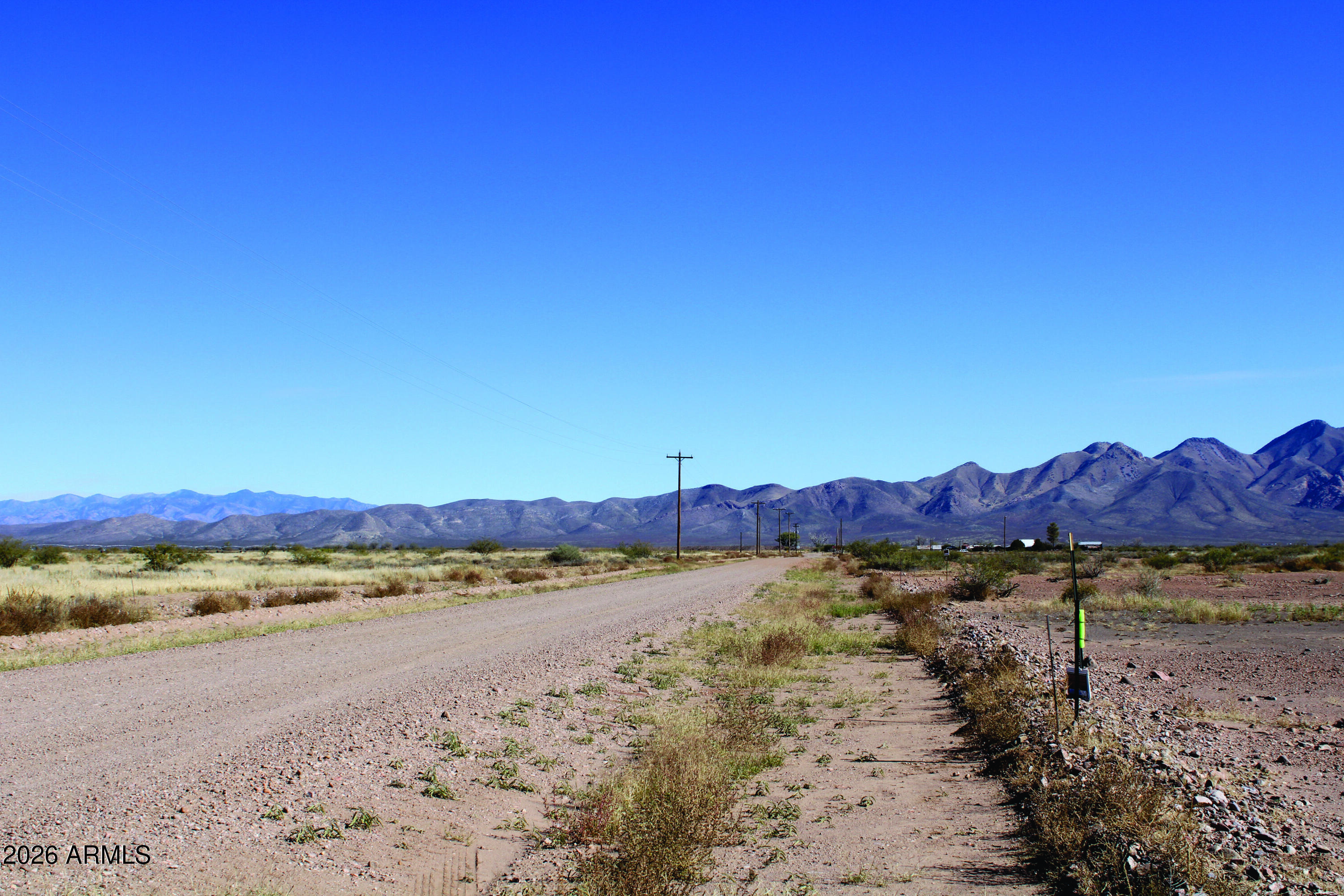 4.10-ac Thompson Road, Unit B Elfrida, AZ 85610 - Photo 23 of 34 a view of mountain with wooden floor and a mountain view