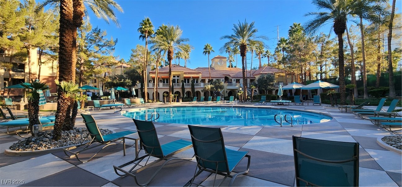 210 East Flamingo Road, Unit 326 Las Vegas, NV 89169 - Photo 39 of 58 Main pool with clubhouse in background.