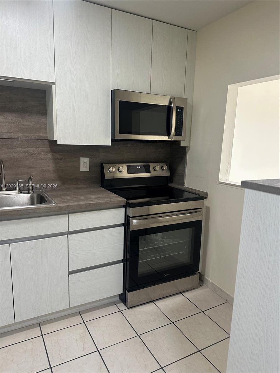 1075 West 68th Street, Unit 309 Hialeah, FL 33014 - Photo 2 of 13
