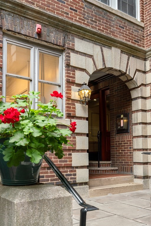 43 Linnaean Street, Unit 32 Cambridge, MA 02138 - Photo 2 of 20 a view of lot of flowers in front of building