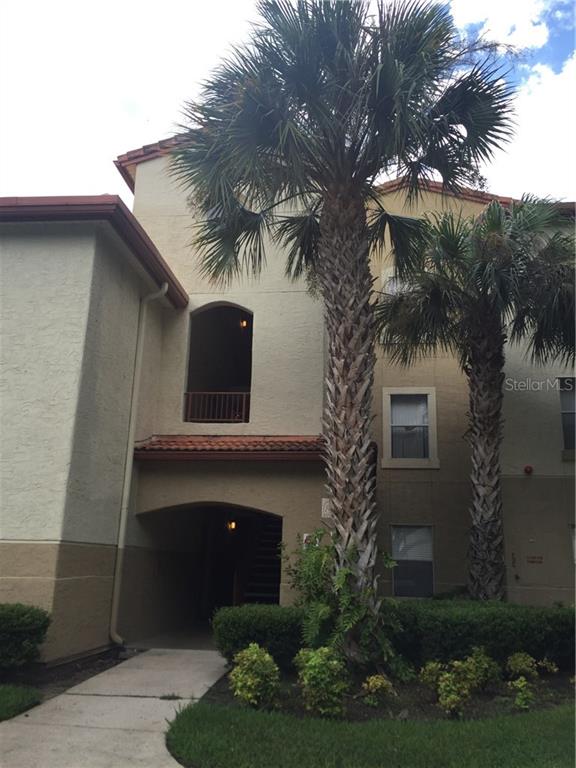 827 Camargo Way, Unit 202 Altamonte Springs, FL 32714 - Photo 1 of 1 a front view of a house with garden