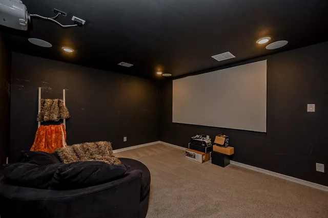 a room with furniture and screen