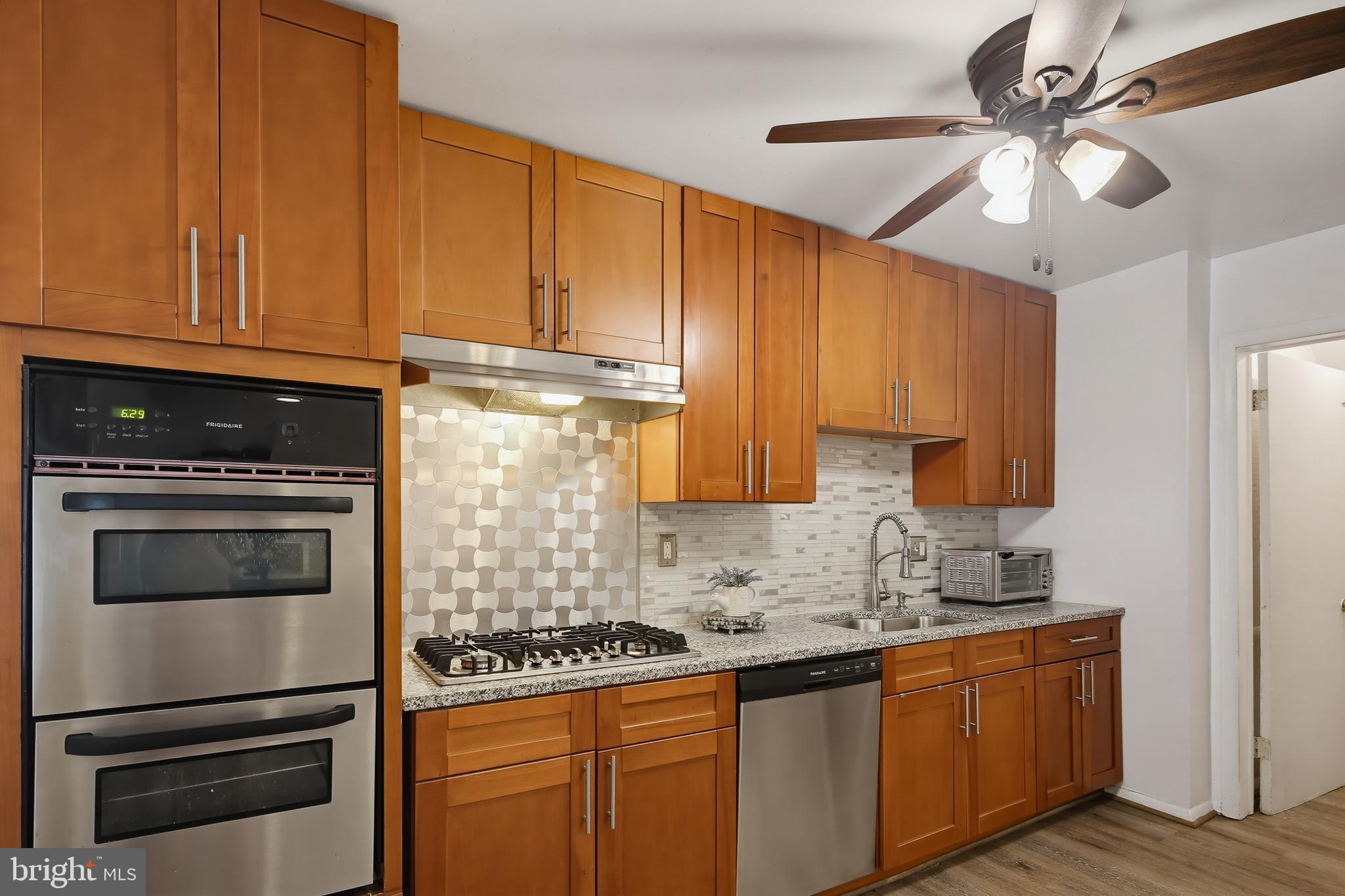 Updated kitchen with newer wall oven and broiler
